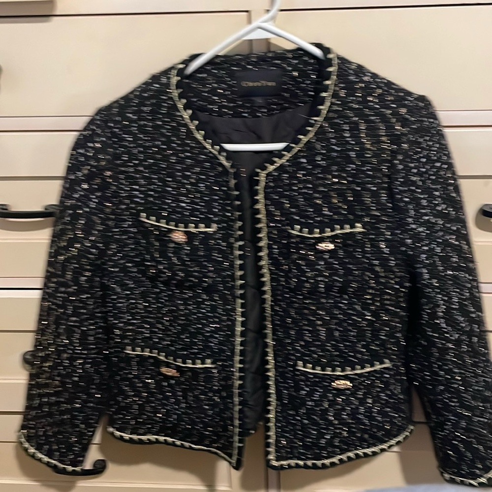 Large classy jacket, black with gold trimming and  beautiful buttons.